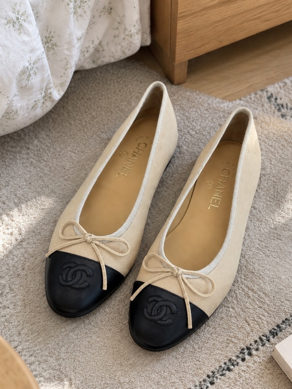 CHANEL Two-Tone Beige Canvas and Black Cap-Toe Ballet Flats